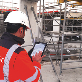 Decorative image of an Eiffage employee using digital data