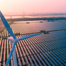 Decorative drone image of wind turbines and solar panels